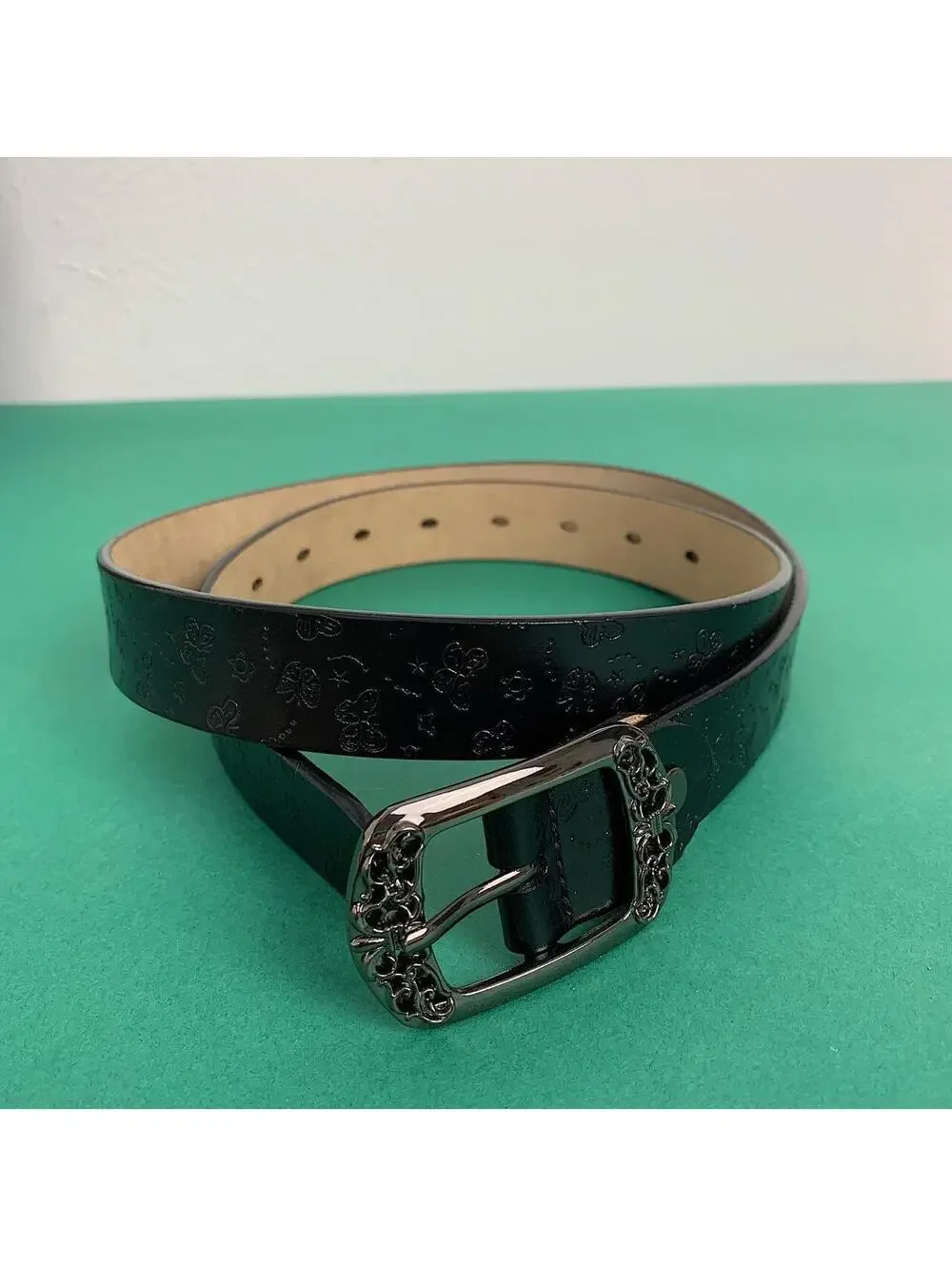 American Western vintage style floral butterfly design black belt. 42 inches len